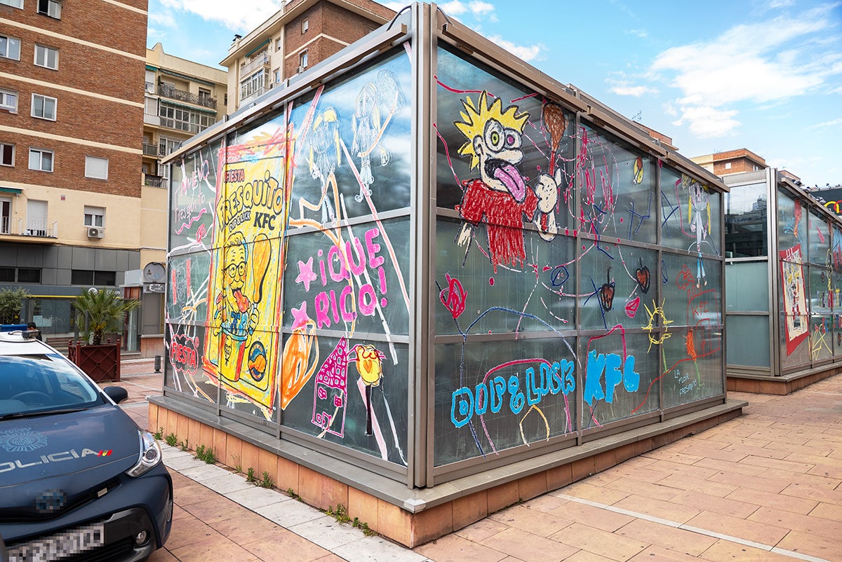 KFC and Fiesta activation in a Madrid street featuring a public building covered in childlike scribbles