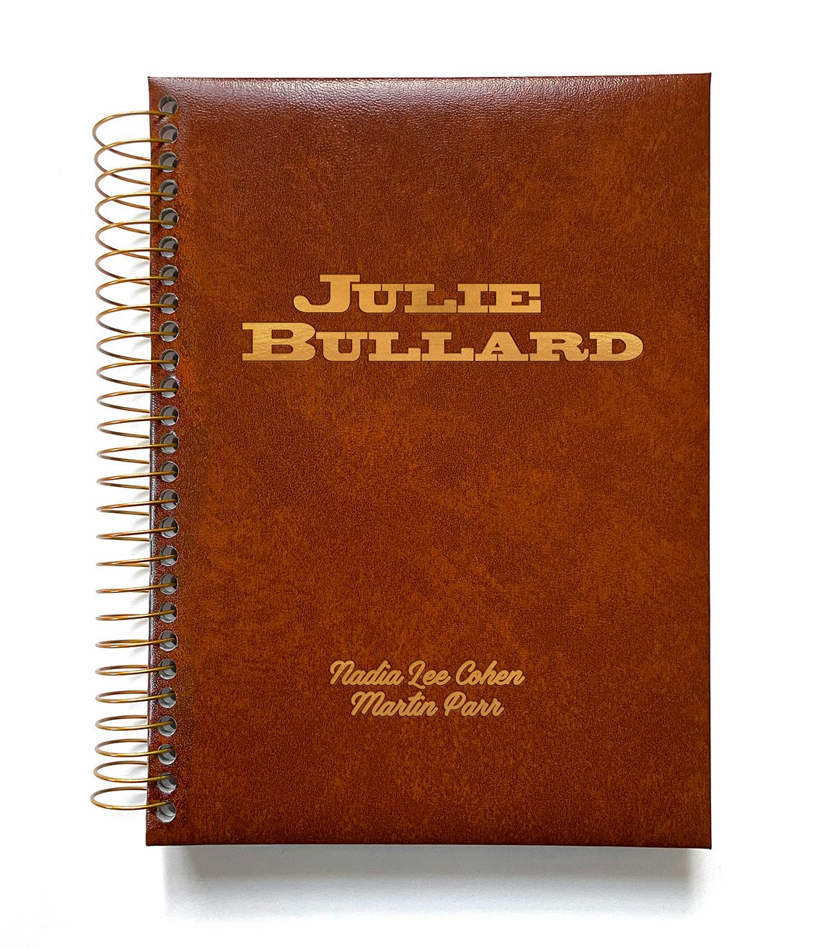 Leather photo album labelled Julie Bullard, Nadia Lee Cohen and Martin Parr in gold text