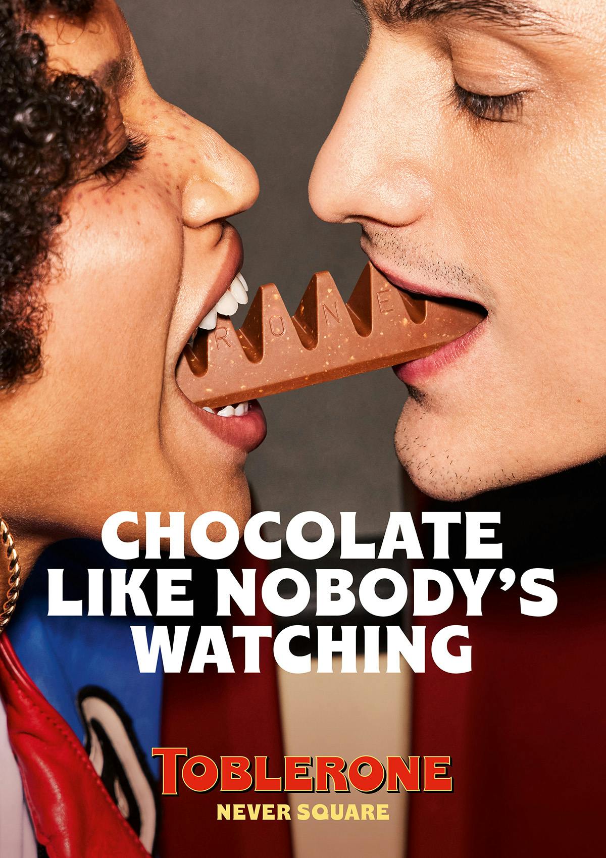 Image of two people eating either end of a Toblerone and the tagline 'Chocolate Like Nobody's Watching'