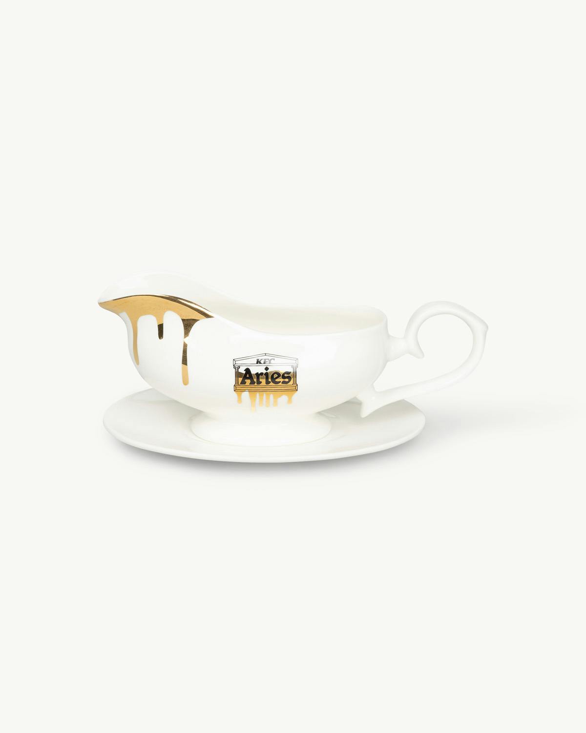 Gravy boat featuring the Aries and KFC logo and decoration in the style of dripping gravy