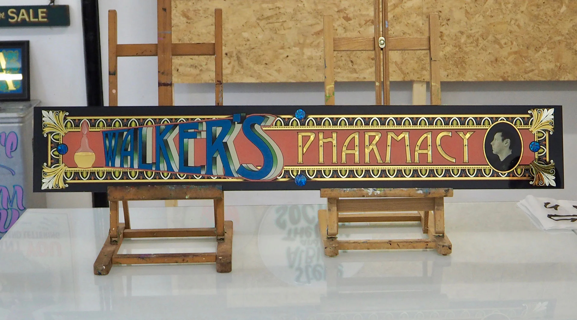 The immaculate craft of reverse glass signwriting