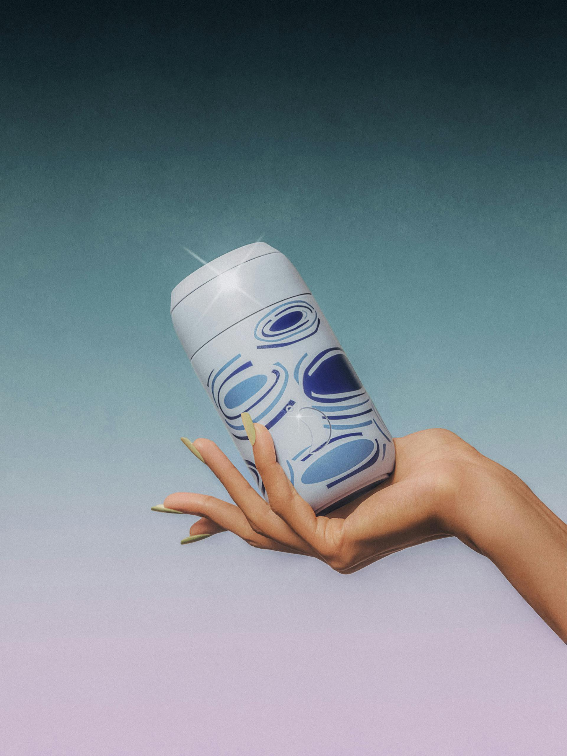 Photograph of a hand holding a blue water bottle by Chilly's and House of Sunny