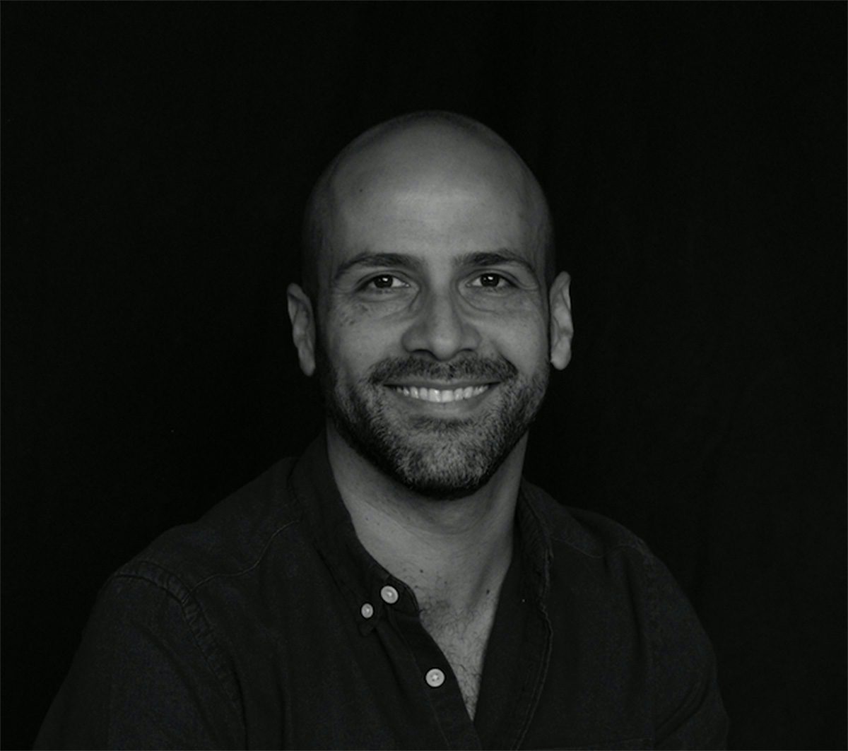 Black and white portrait photo of David global CCO Pancho Cassis