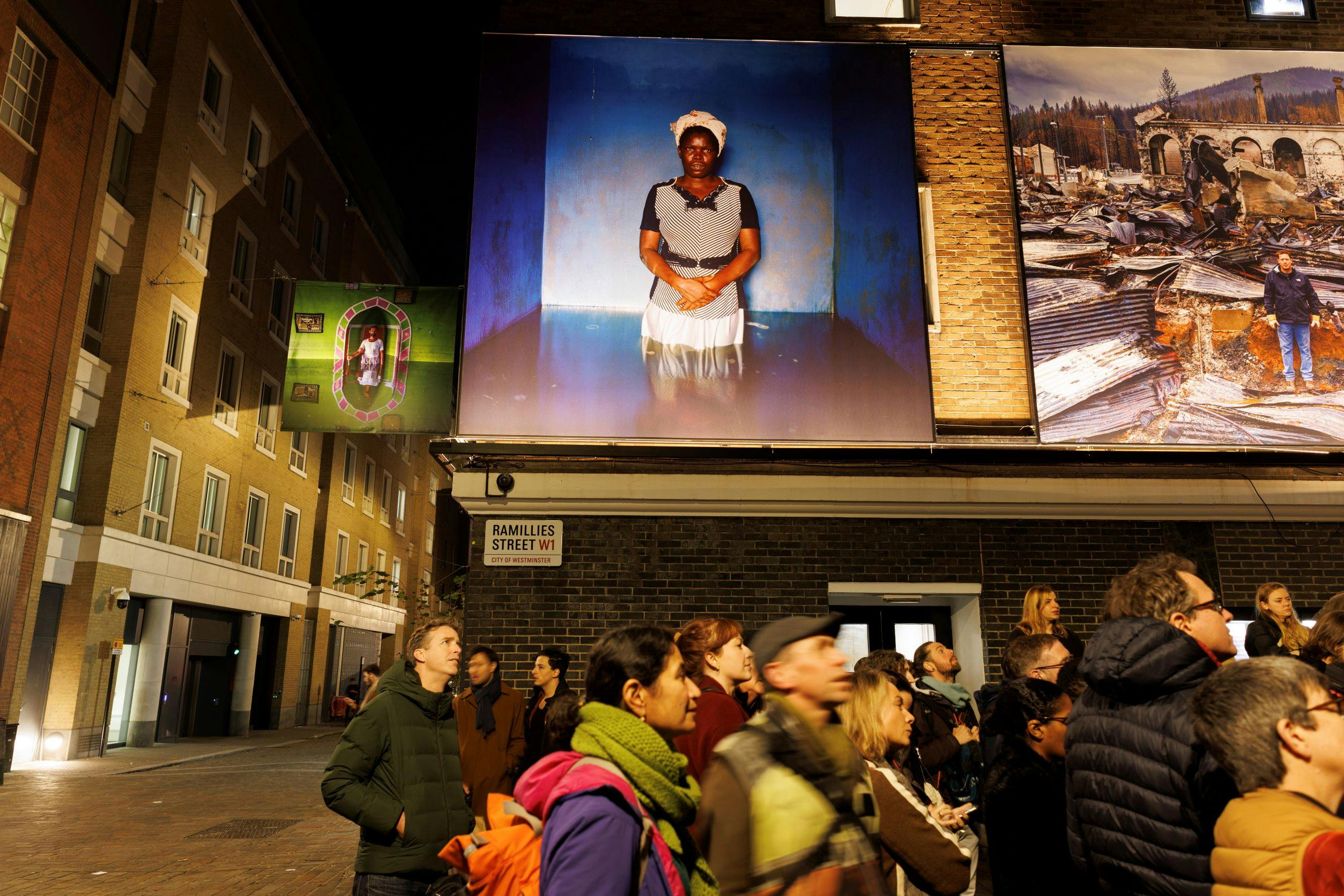 Fire / Flood by Gideon Mendel in Soho Photography Quarter November 2022 © Crispin Hughes Courtesy of The Photographers’ Gallery