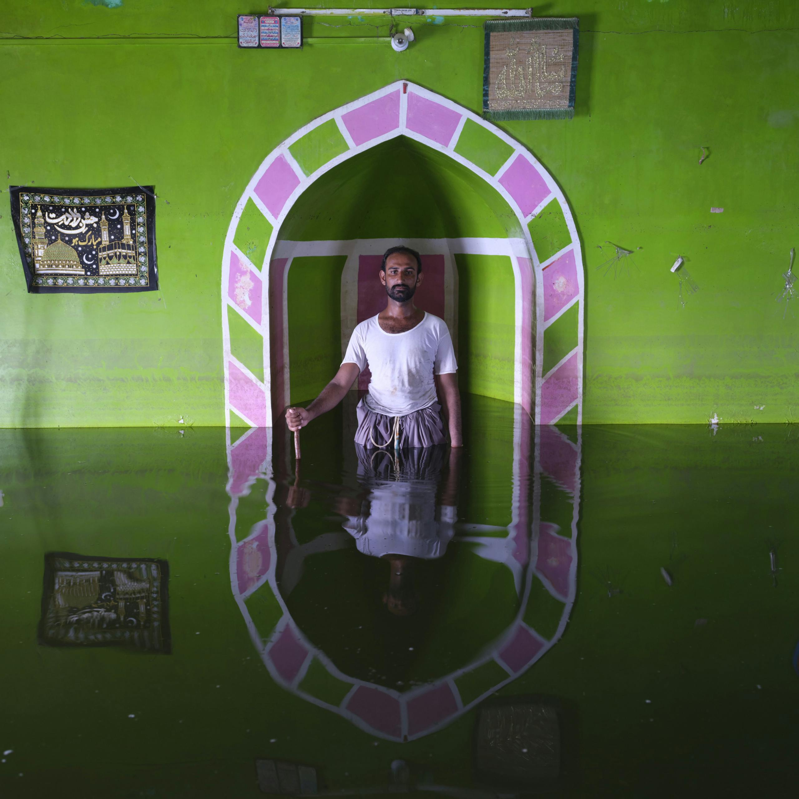 Amjad Ali Laghari, Goth Bawal Khan village, Sindh Province, Pakistan September 2022. From the series Drowning World © Gideon Mendel