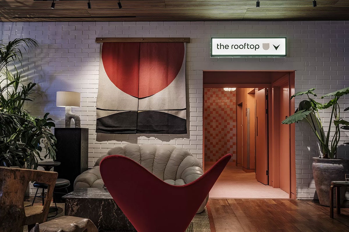 One Hundred Shoreditch hotel lobby, with different flooring and lighting to highlight entering new space