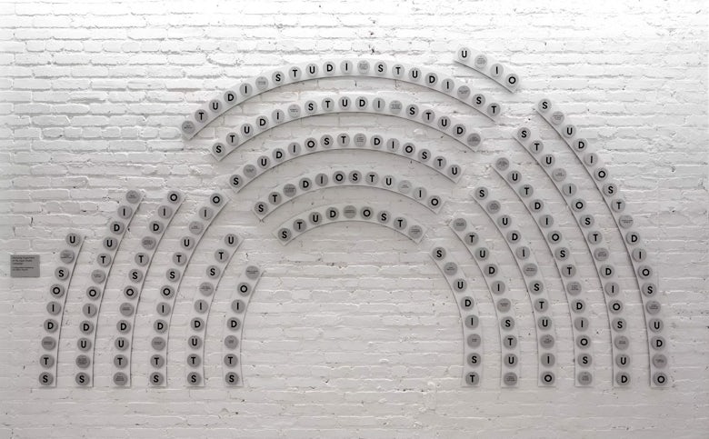 Wall installation in the shape of semi-circular rows of theatre seats
