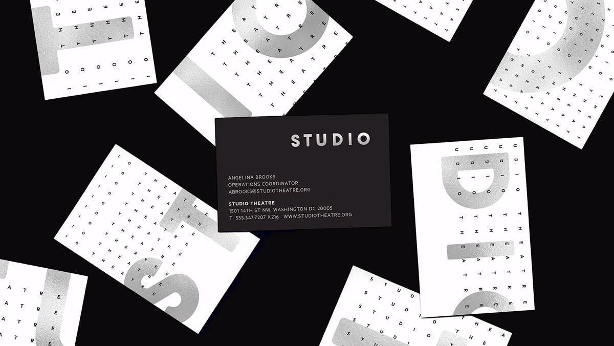 Black and white business cards featuring the new Studio Theatre branding
