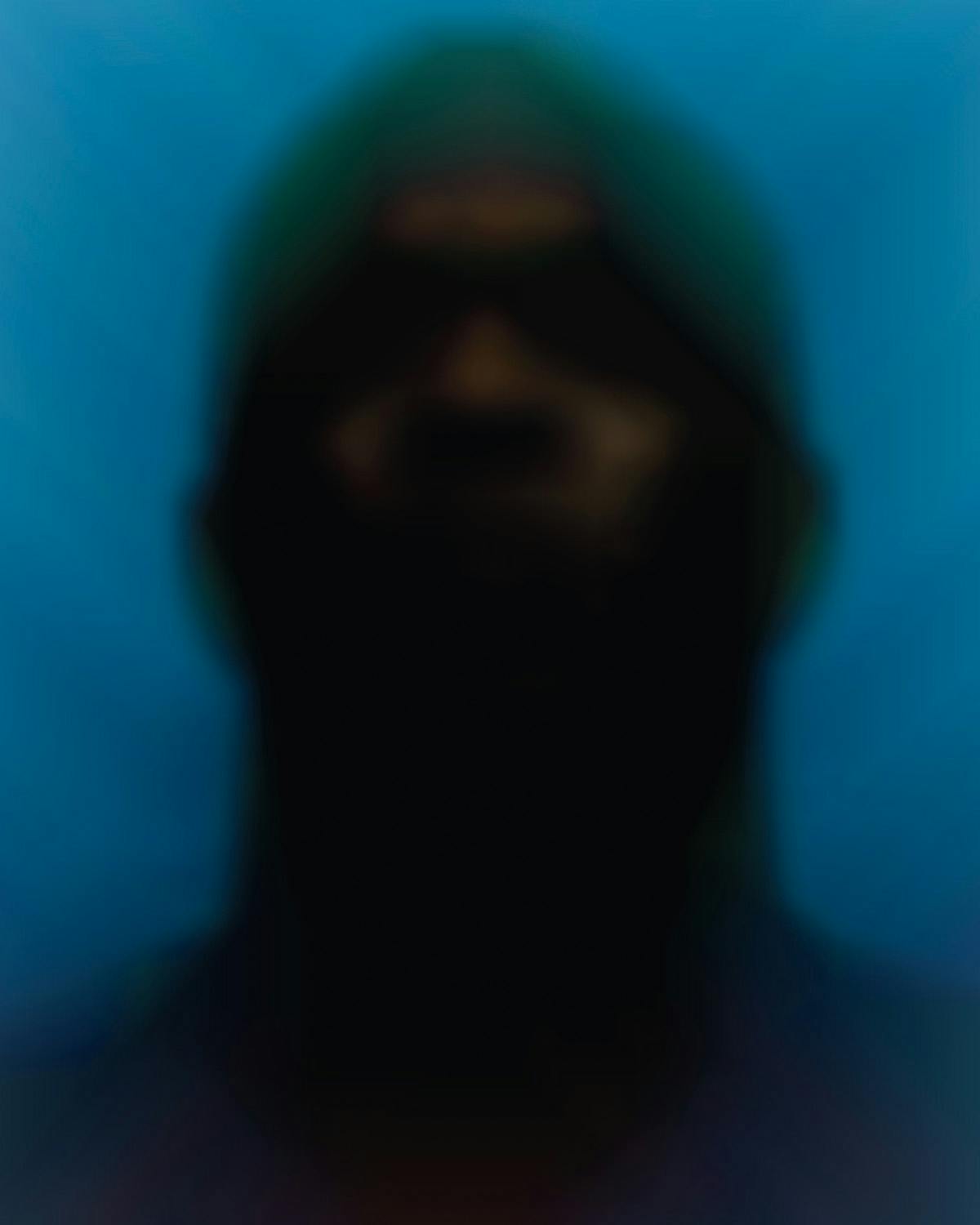 Blurred image of a person's mugshot against a blue backdrop by Paolo Cirio