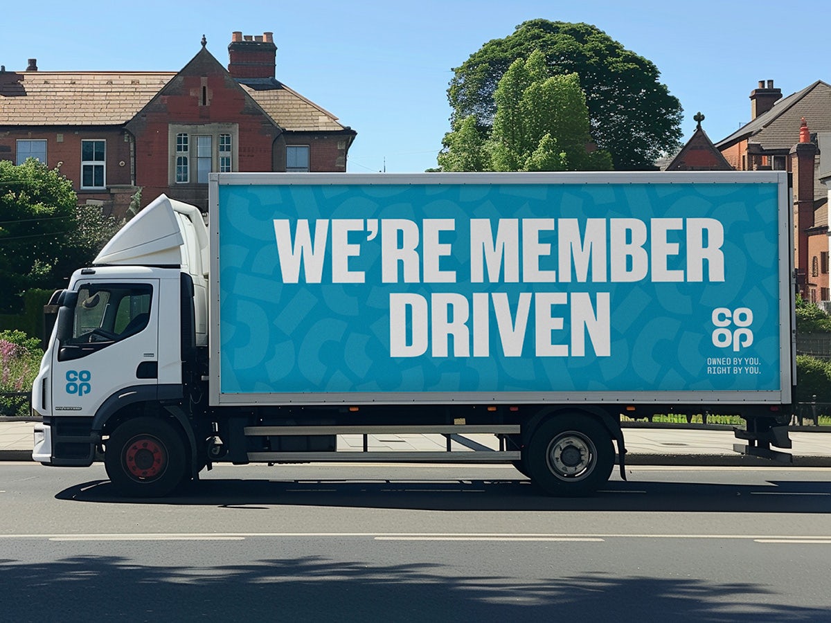 Lorry showing Co-op's new identity along the side, with the tagline 'we're member driven'
