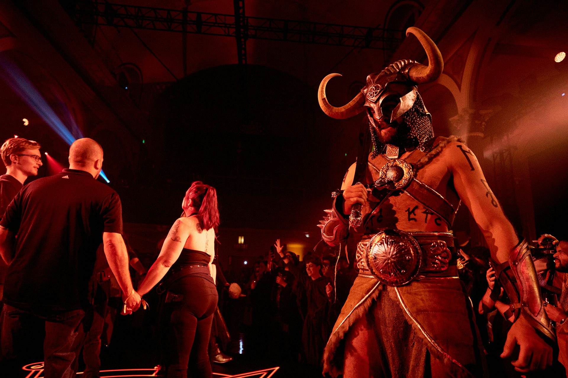 Performer wearing a horned mask at the Diablo IV event by Studio Secret Cinema