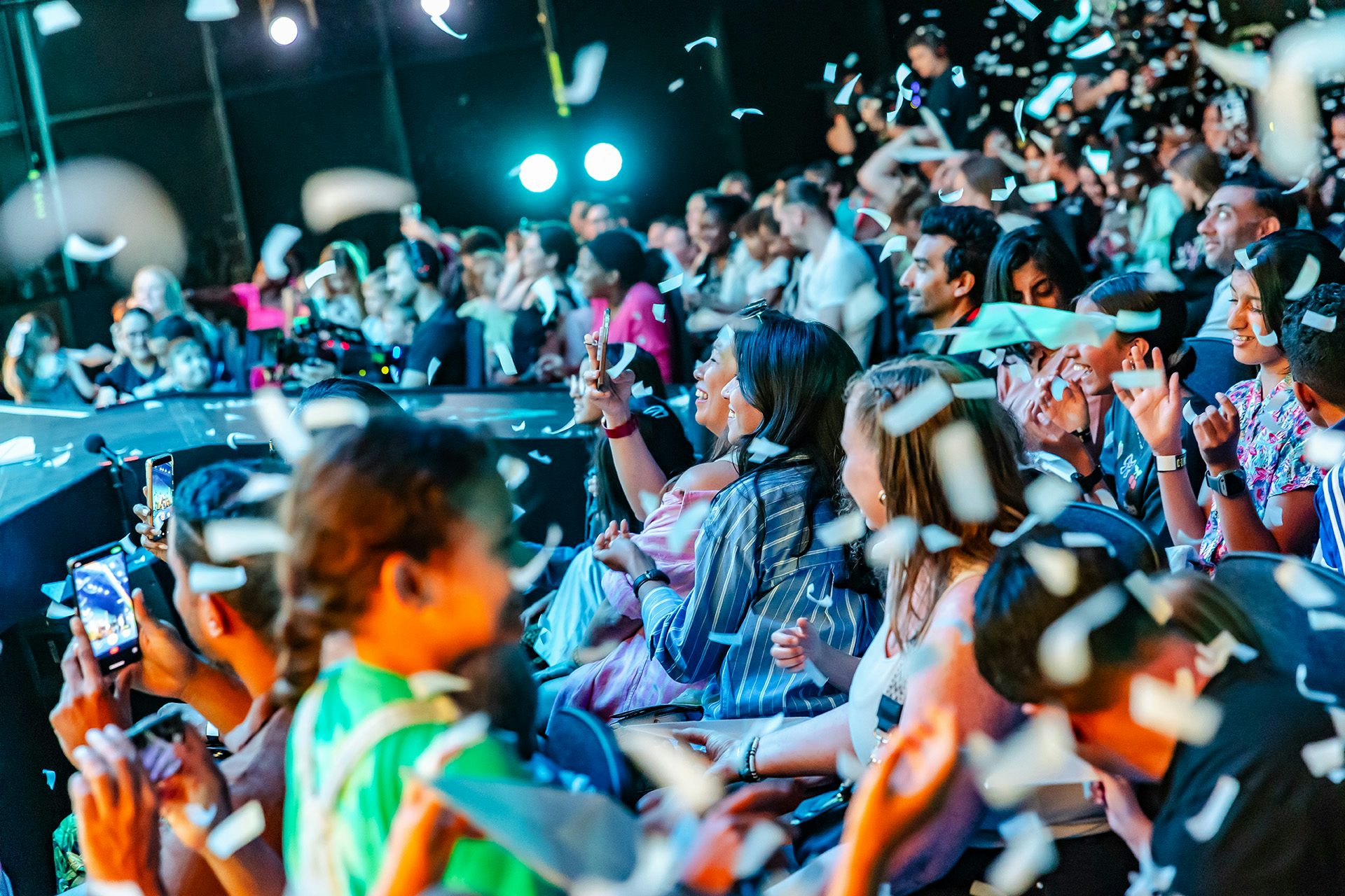 Crowds cheering at an EE event by Studio Secret Cinema
