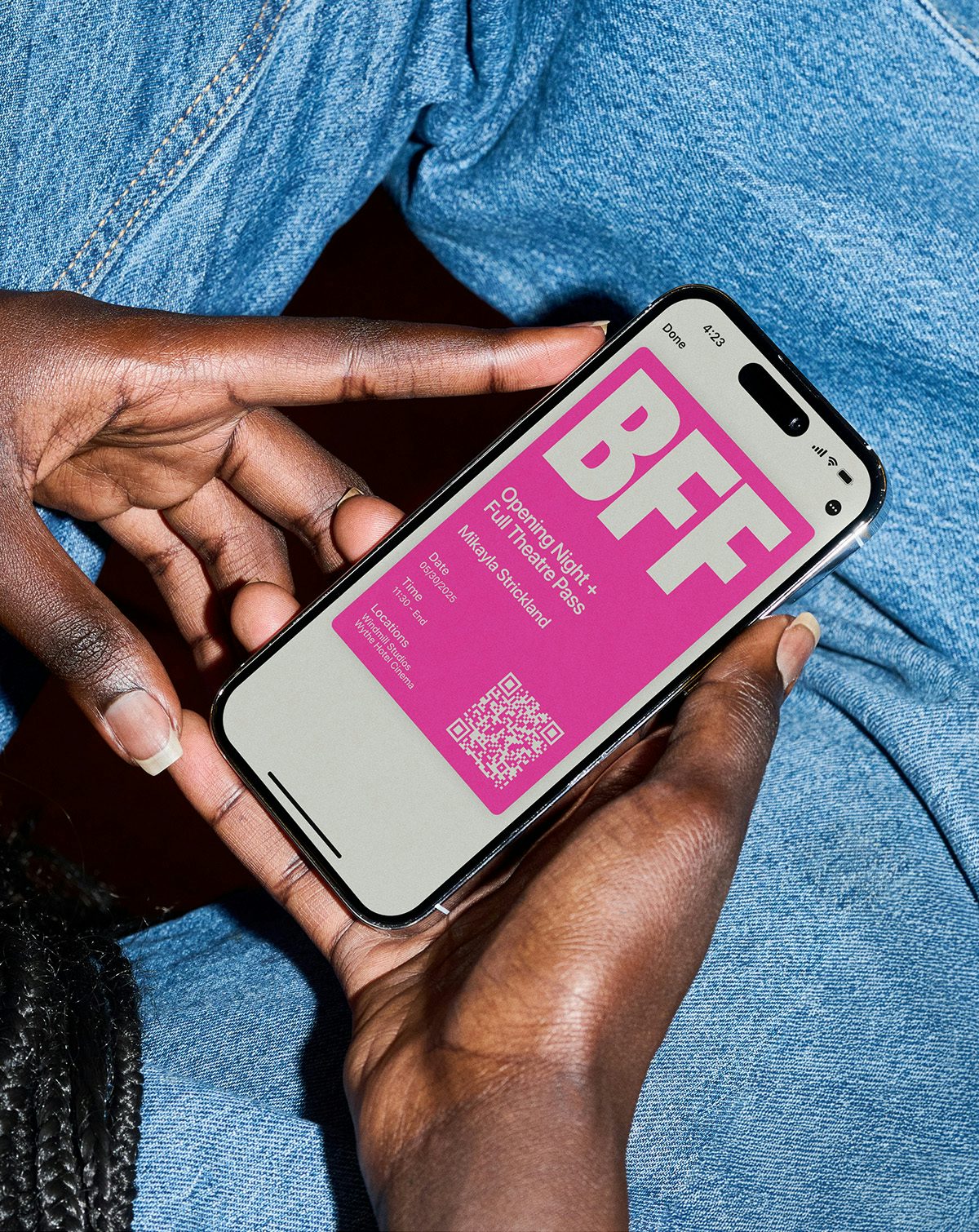 A bright pink digital ticket headlined 'BFF' shown on a phone