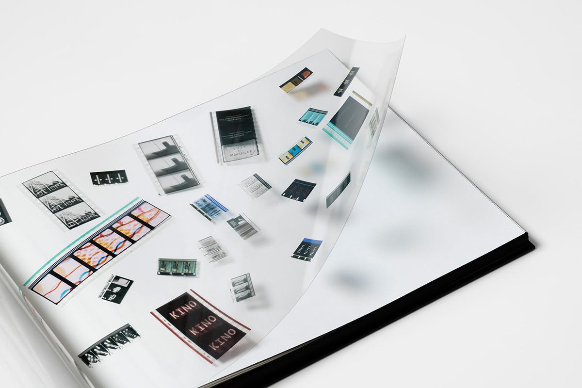 Spread from Mubi's book Read Frame Type Film showing a page filled with images of film strips printed on acetate