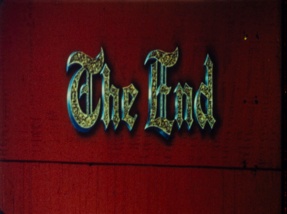 Film still featuring the words 'The end' in narrow gothic font on a red background, taken from Mubi's book Read Frame Type Film