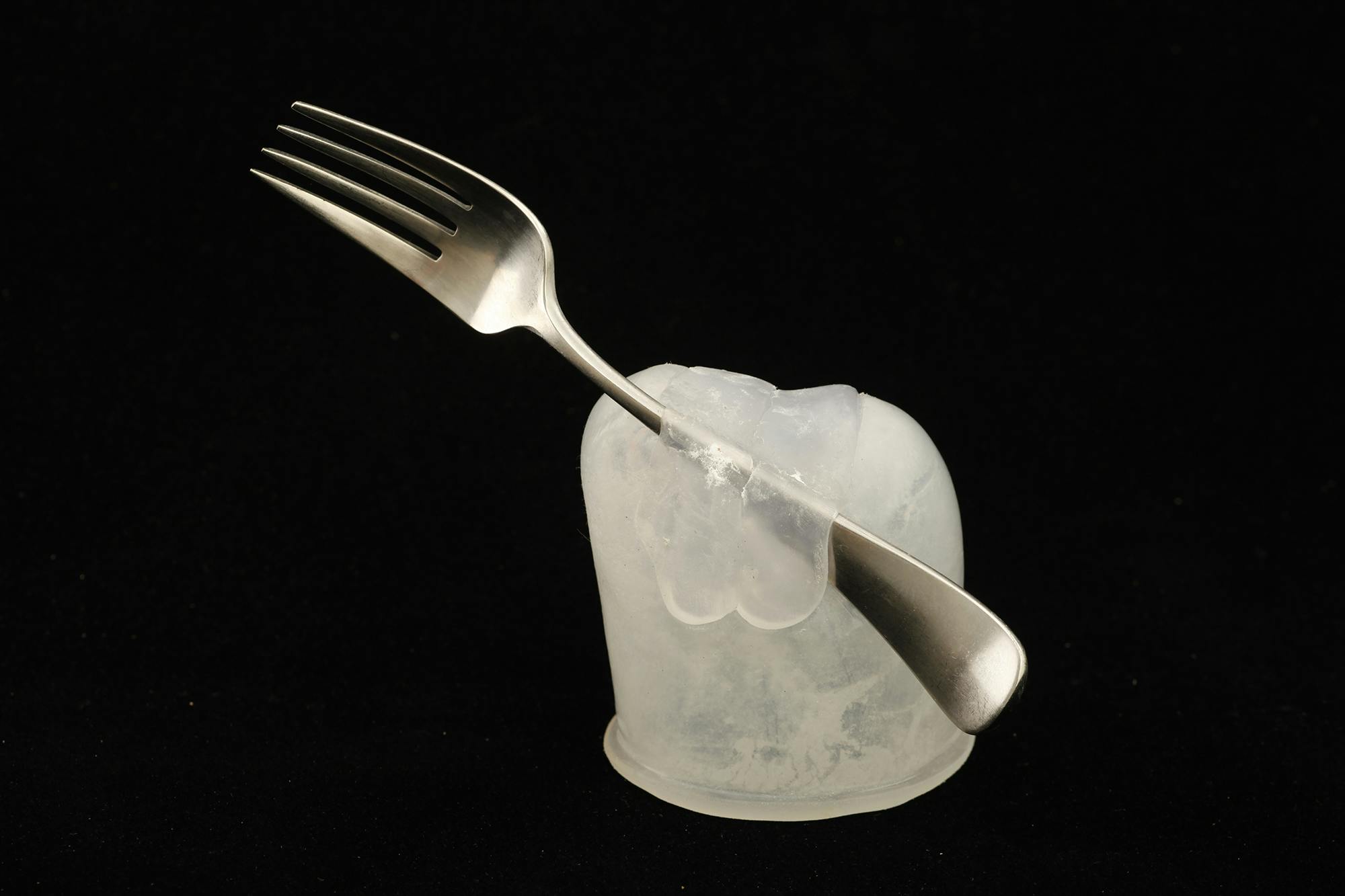 Fork for Cindy suspended in a silicone cap; Photo: Michael J Maloney 