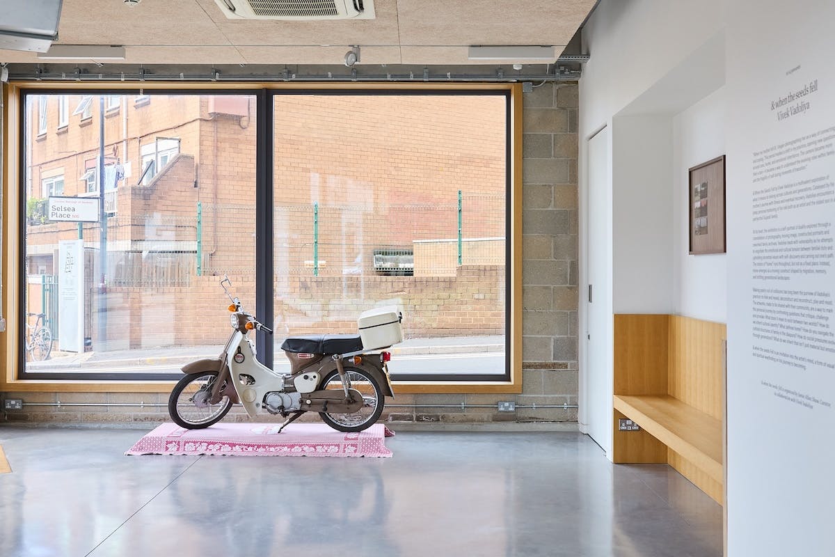 Moped inside a gallery space at Vivek Vadoliya's exhibition