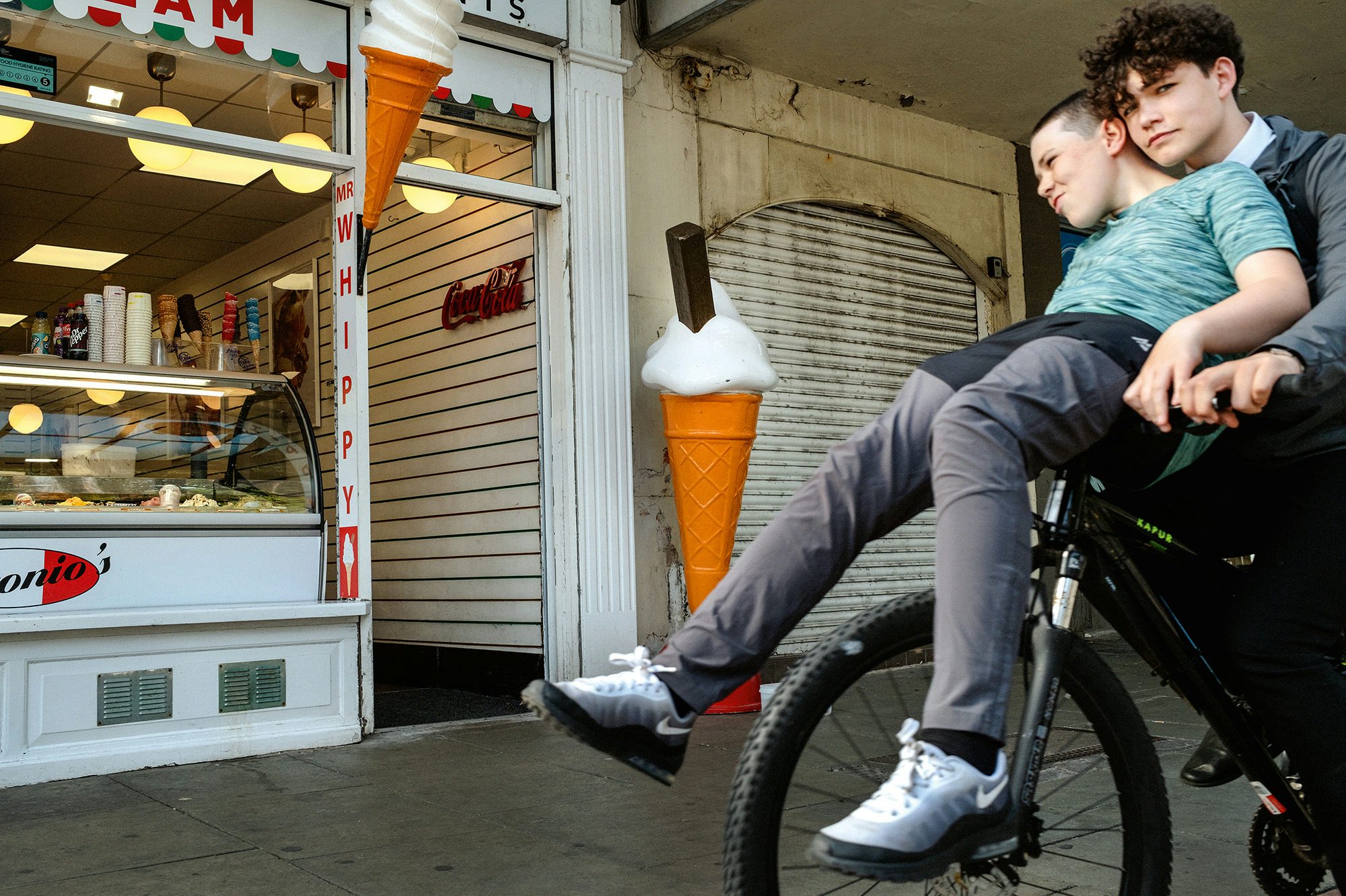 Two boys on a bike in Southport, from Merlin Daleman's book Mutiny
