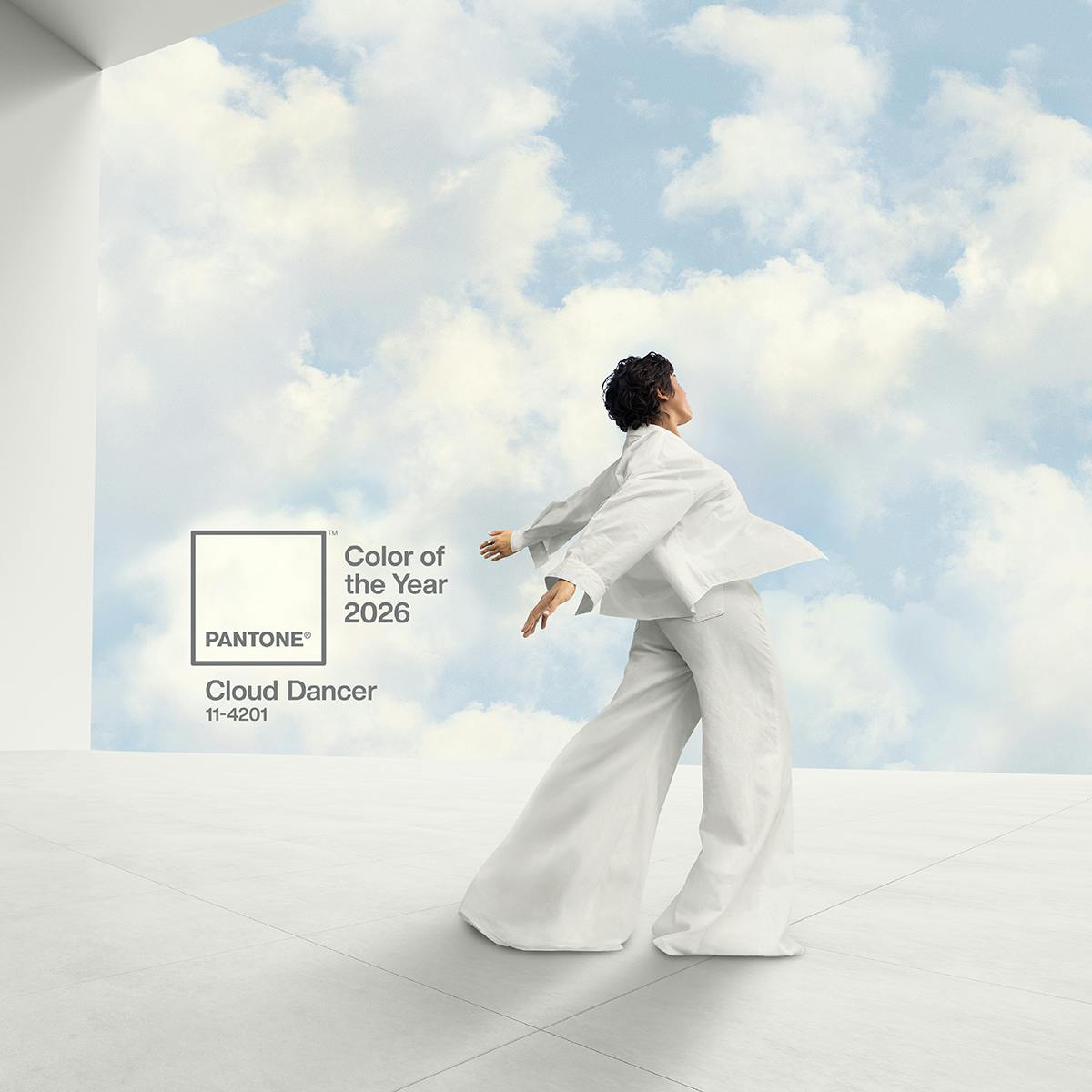 woman in white looking at clouds Pantone colour of the year