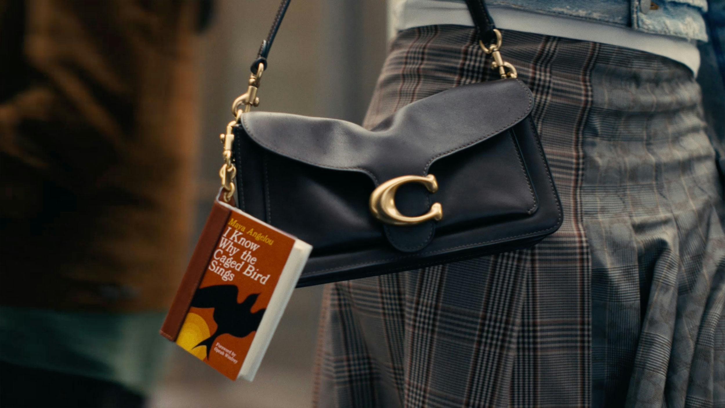 Coach champions banned books in transportive new campaign